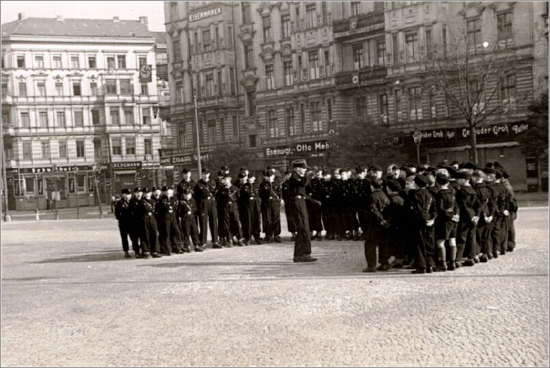 Hitler Youth gather on a street in Berlin